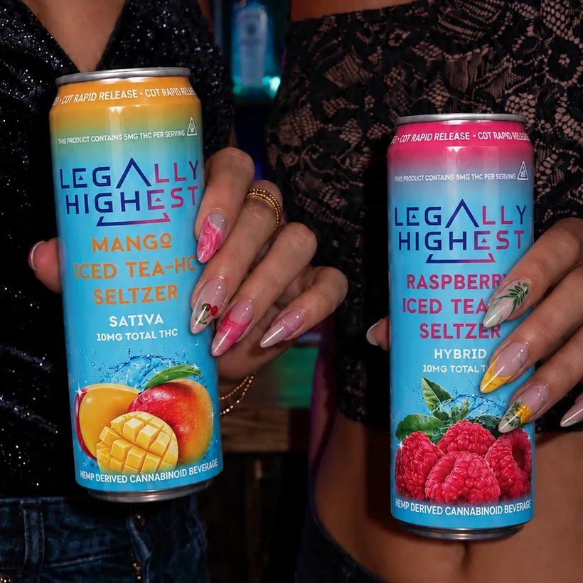 Two cans held at a bar